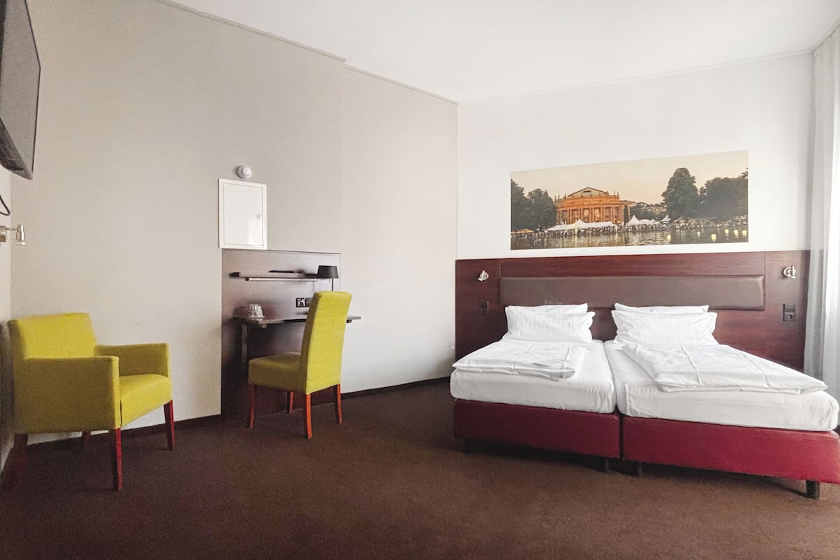 Habitación estándar con 1 cama matrimonial o 2 individuales | Escritorio, insonorización, wifi gratis y ropa de cama