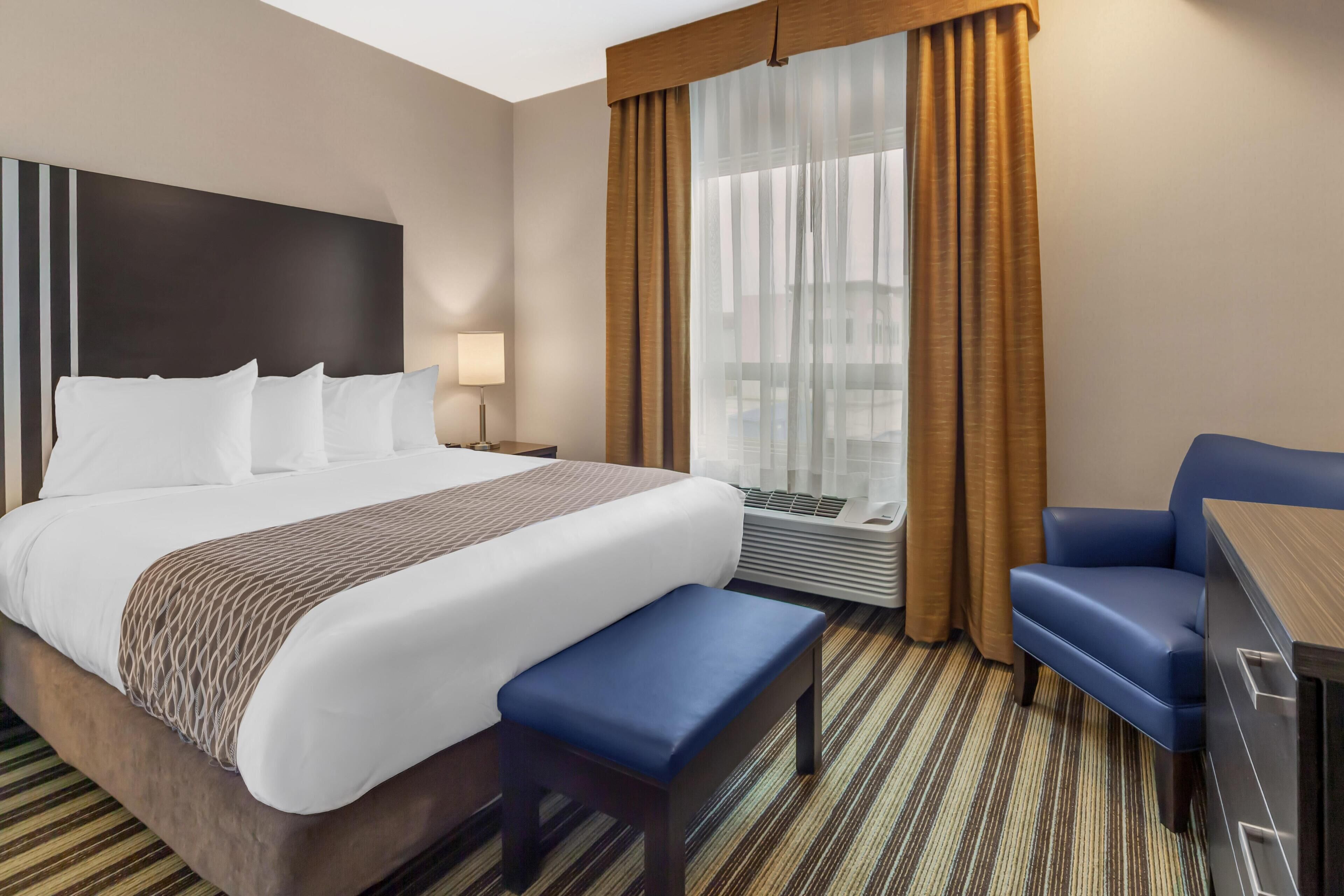 Premium bedding, down comforters, in-room safe, desk