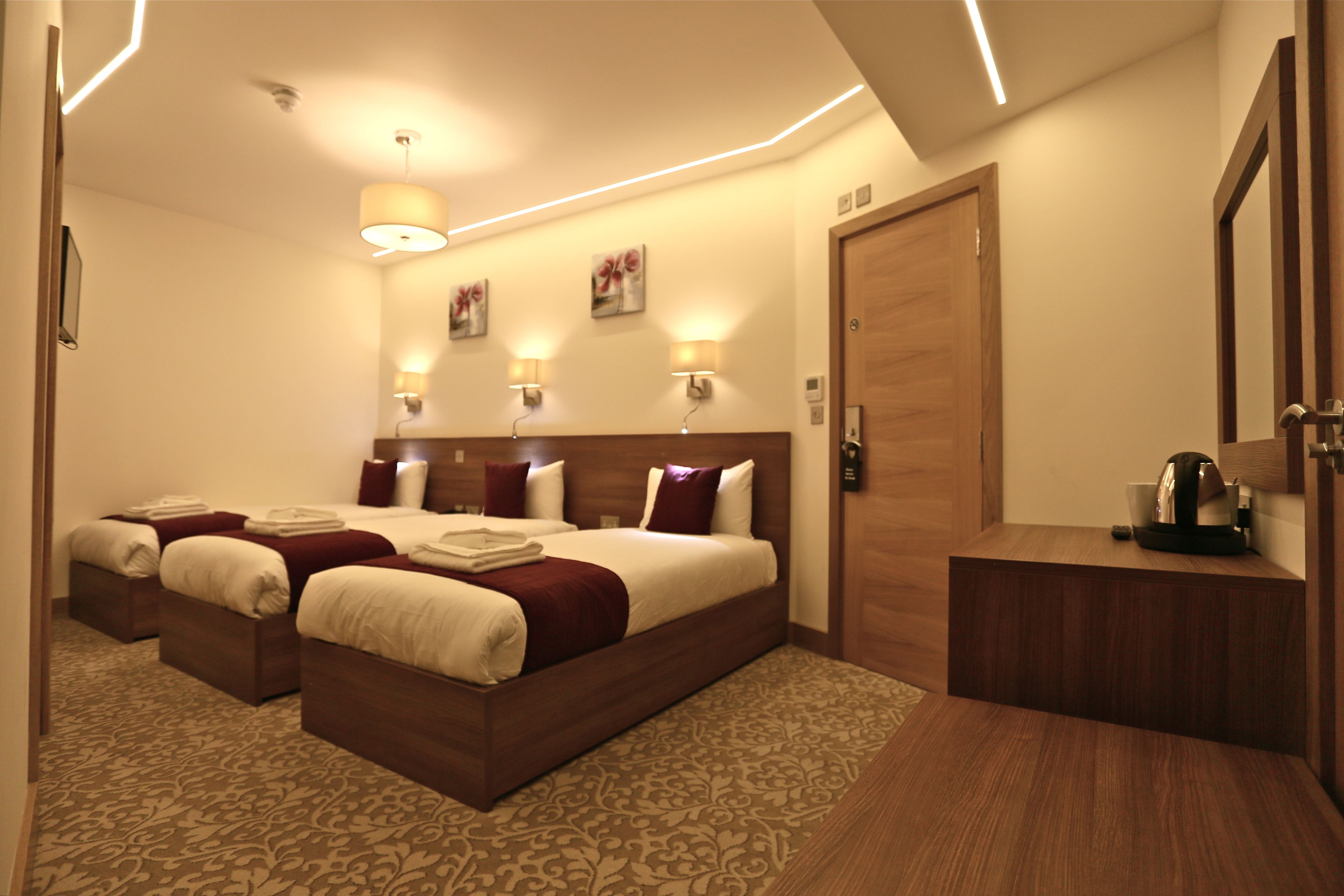 Triple Room | In-room safe, desk, iron/ironing board, free cribs/infant beds