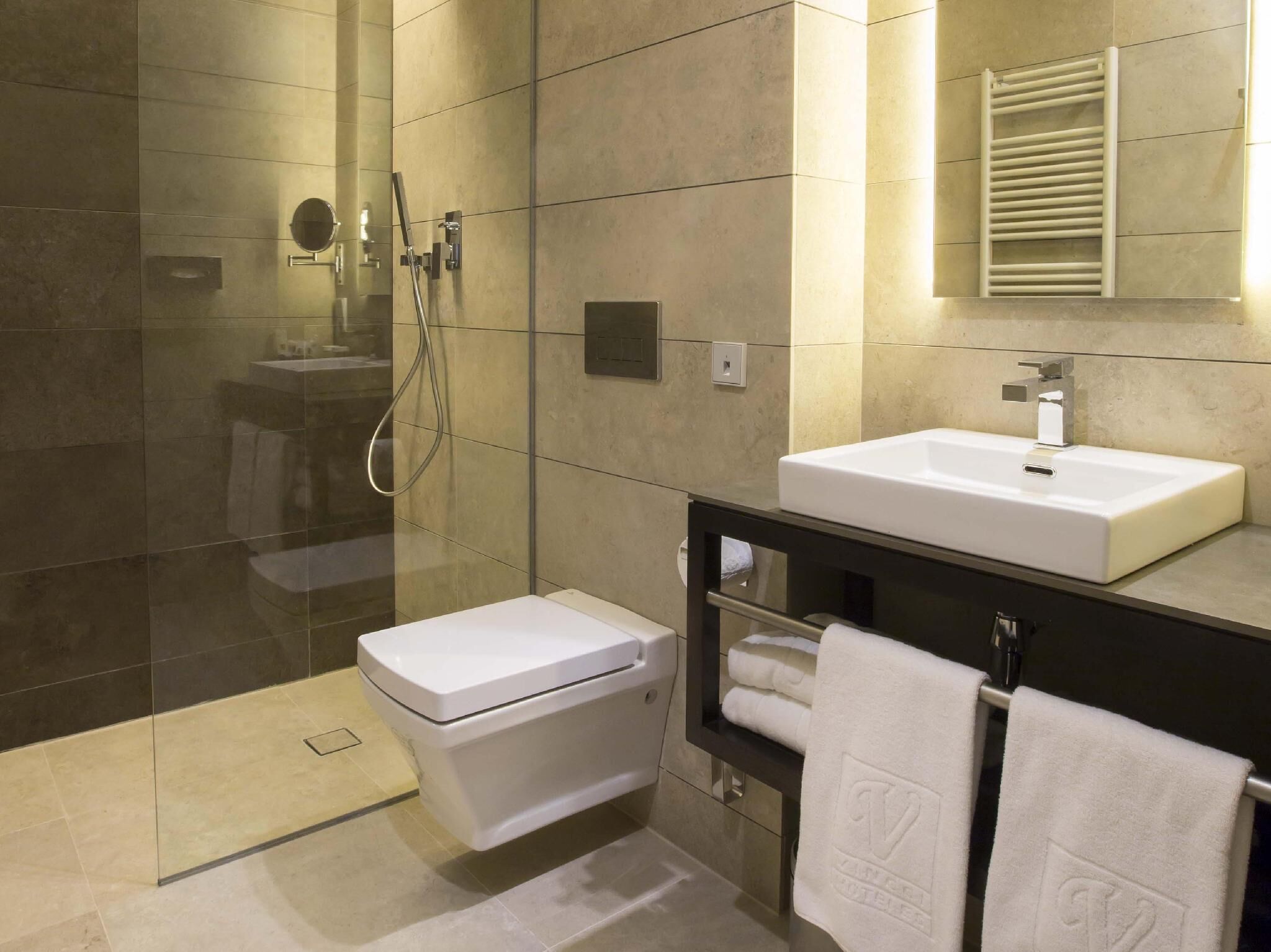Bathroom | Shower, rainfall showerhead, eco-friendly toiletries, hair dryer