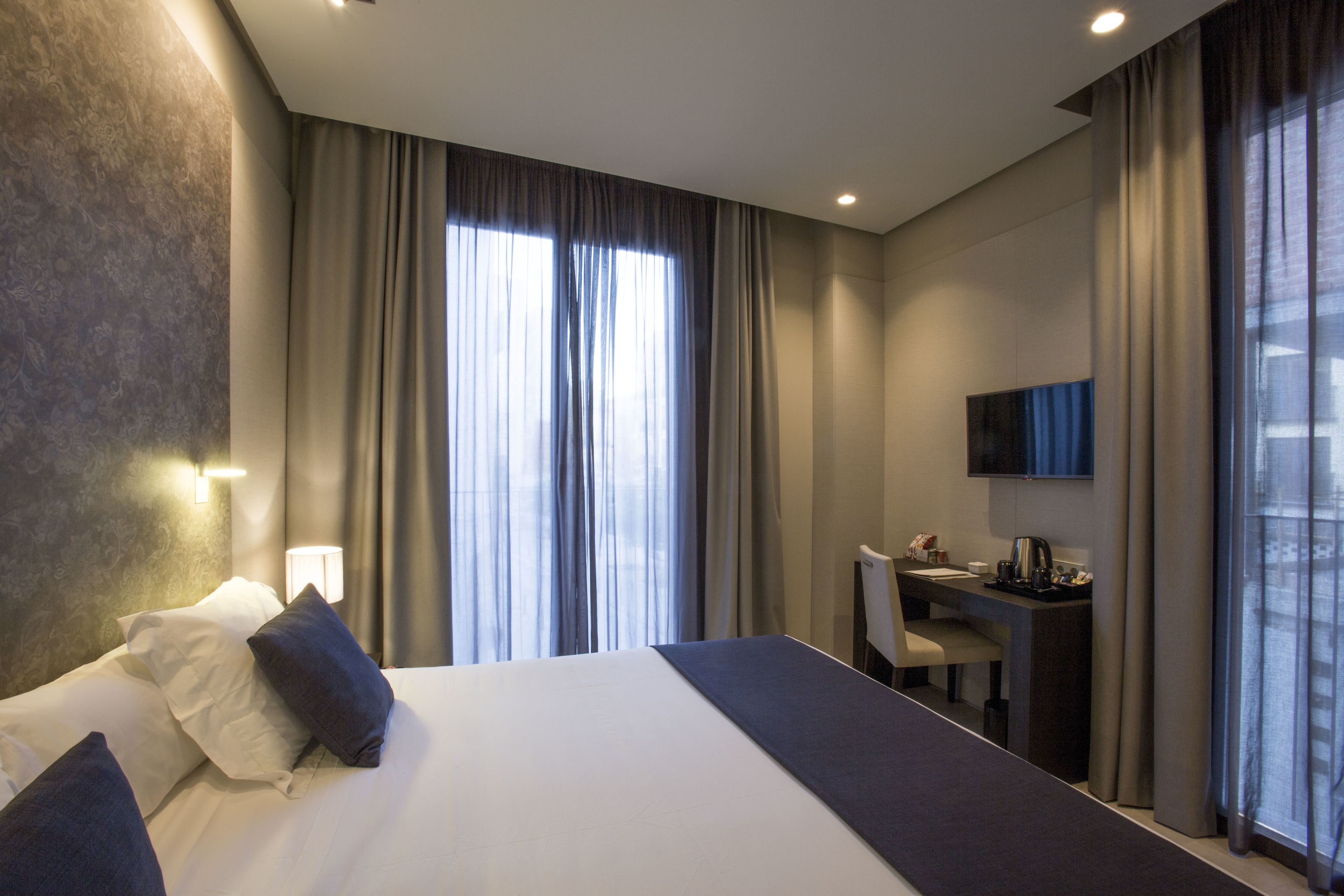 premium bedding, down duvets, minibar, in-room safe