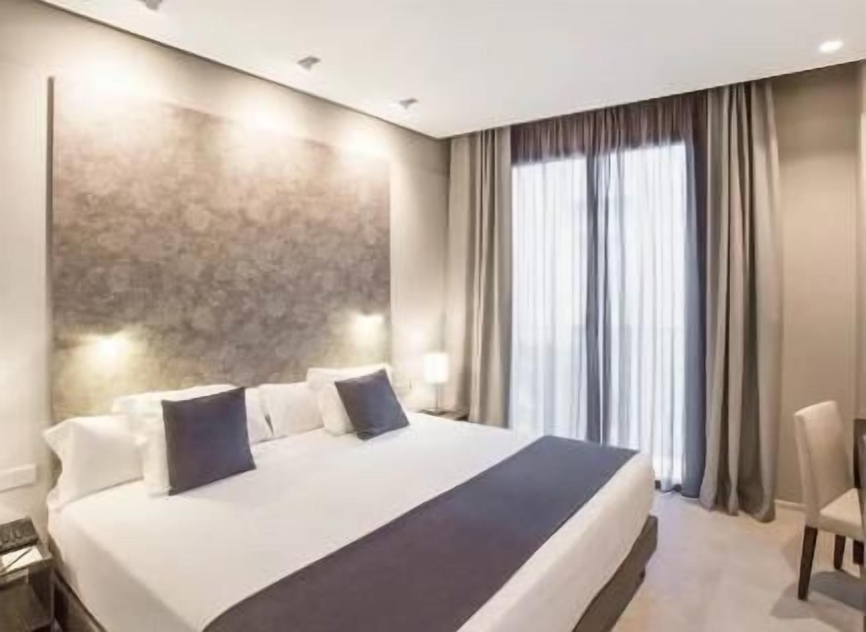 Premium bedding, down duvets, minibar, in-room safe
