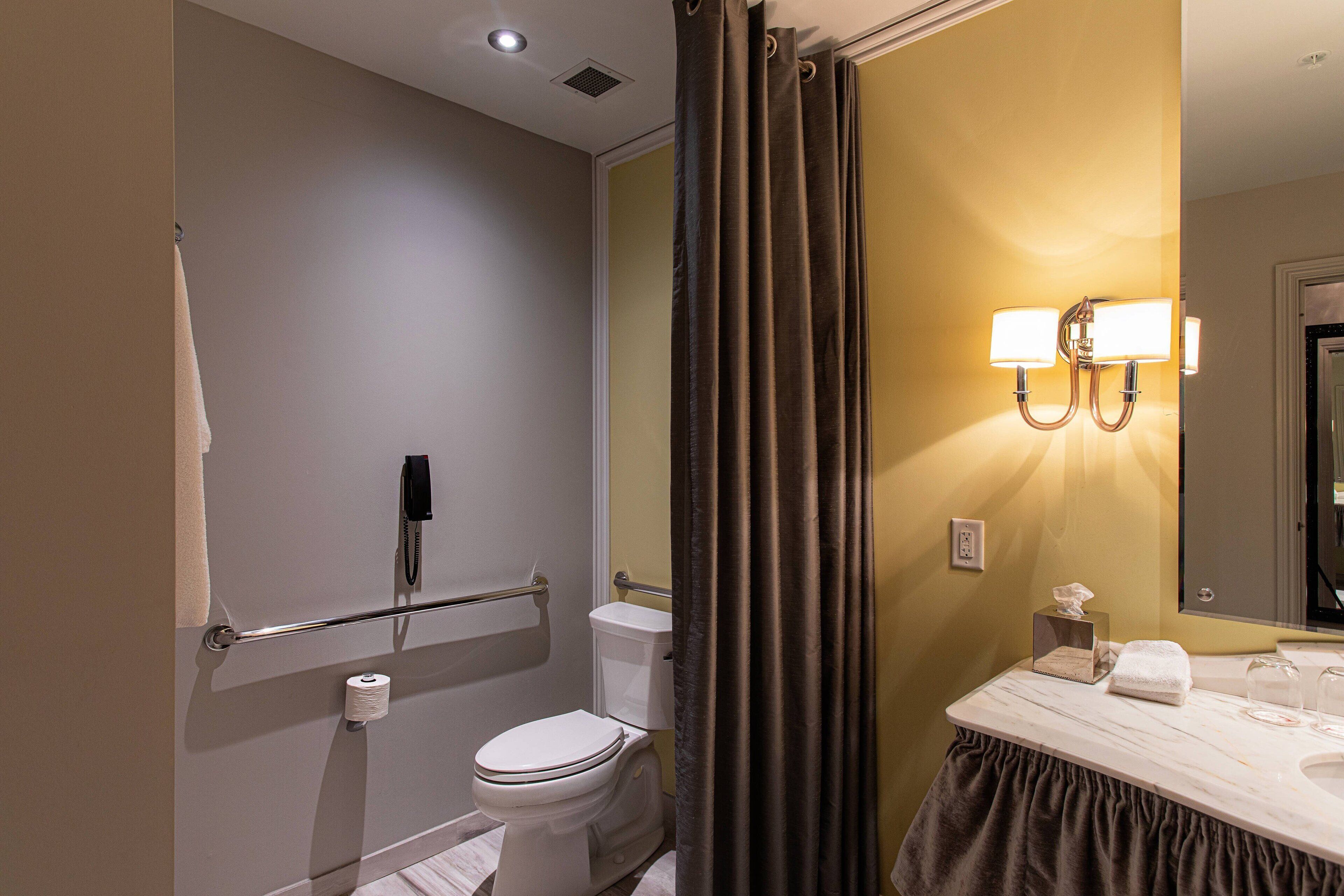 designer toiletries, hair dryer, bathrobes, towels