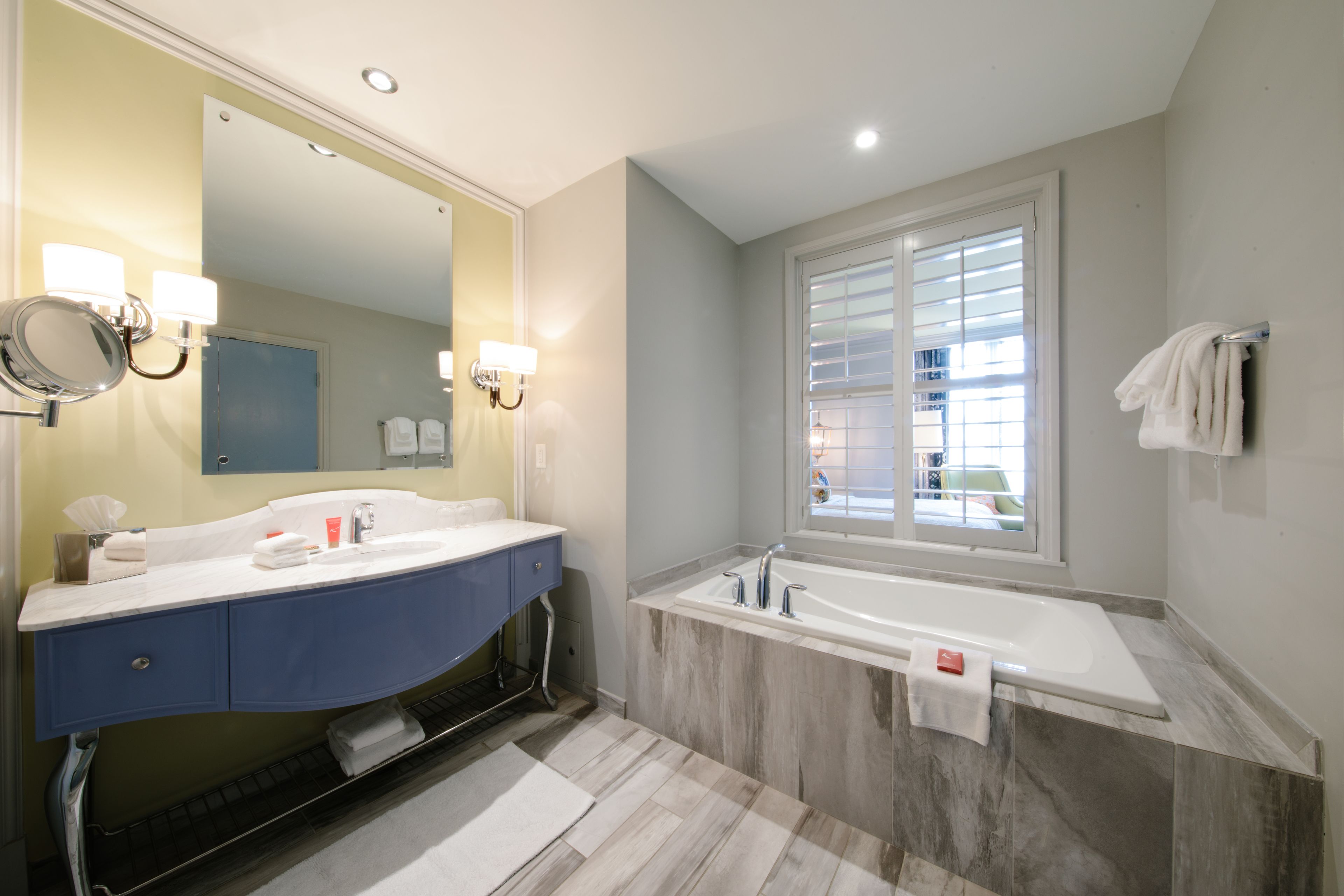 designer toiletries, hair dryer, bathrobes, towels