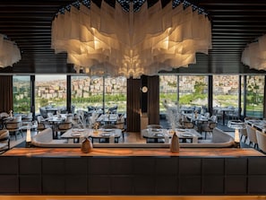 Breakfast, lunch, dinner served; international cuisine