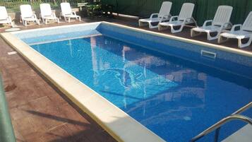 Seasonal outdoor pool, free pool cabanas, pool umbrellas