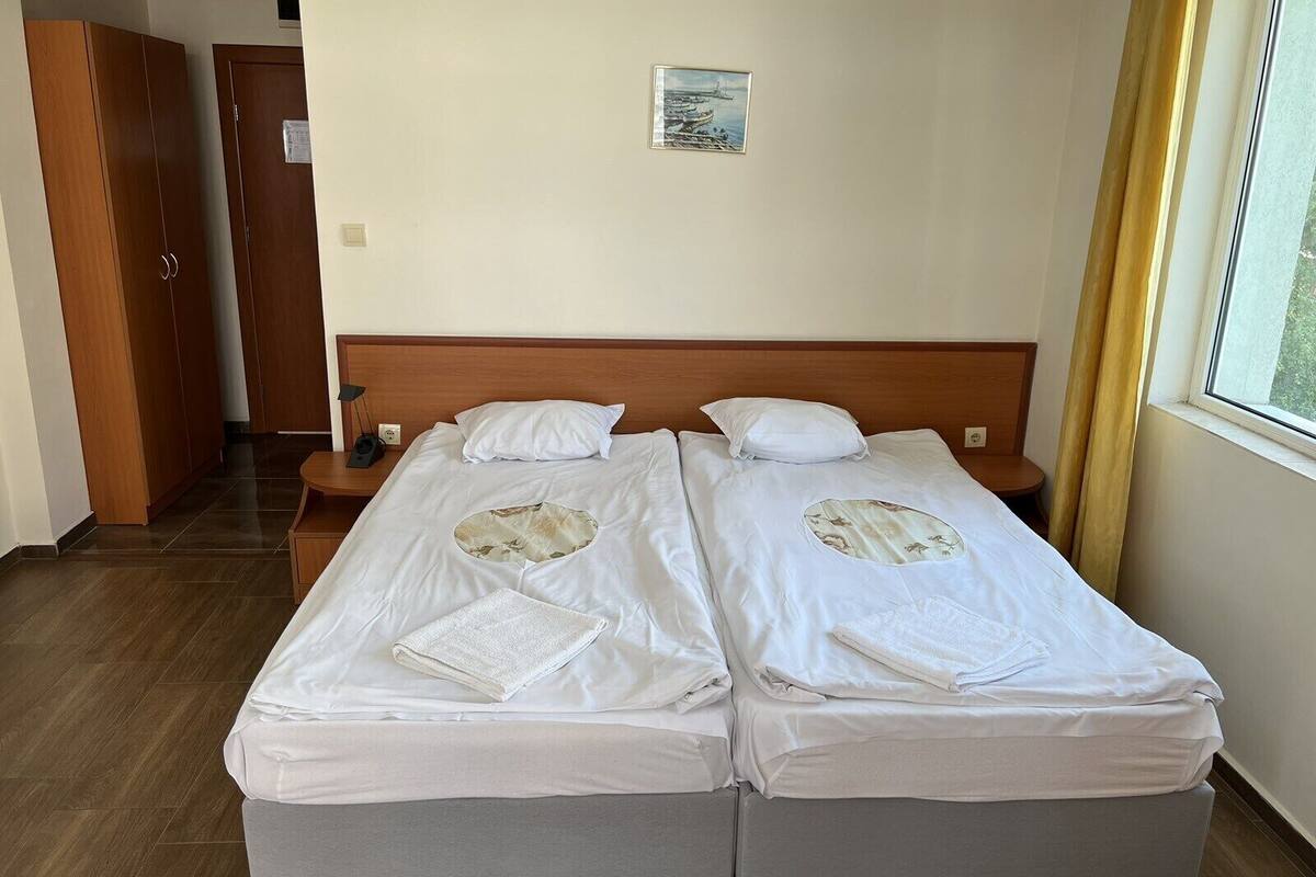 desk, blackout curtains, iron/ironing board, free wifi