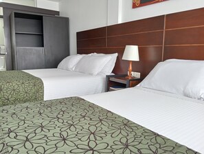 Ropa de cama de alta calidad, minibar, caja fuerte y escritorio