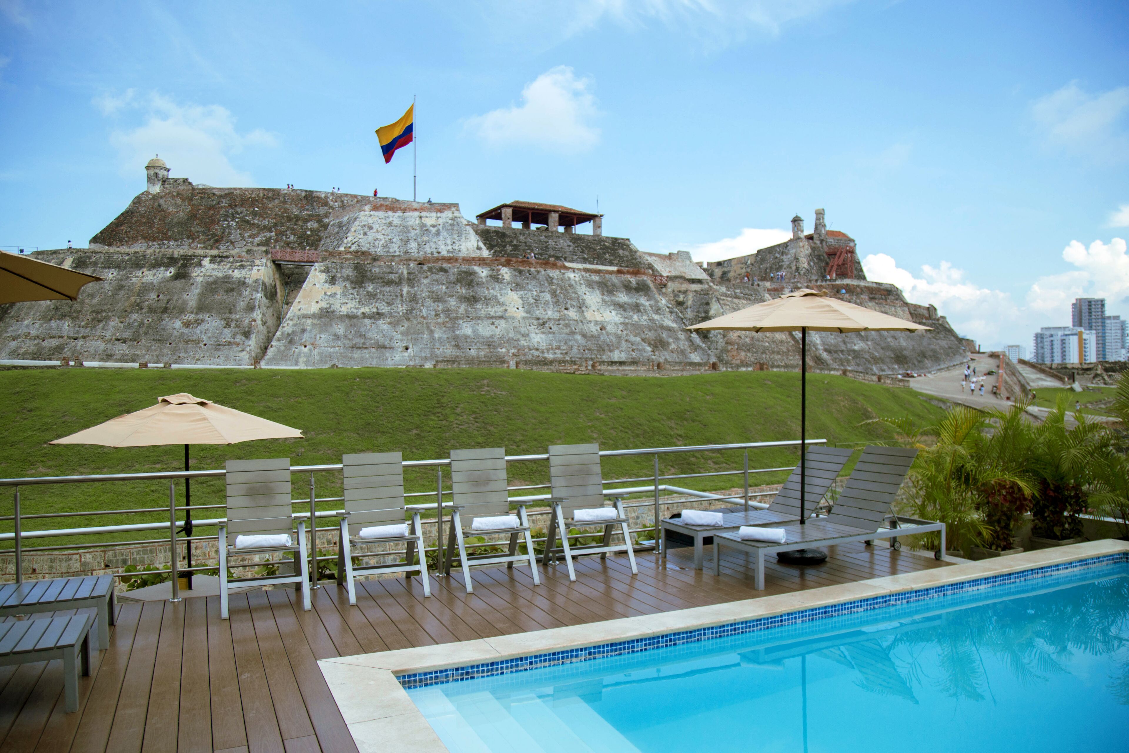 outdoor pool, pool umbrellas, pool loungers