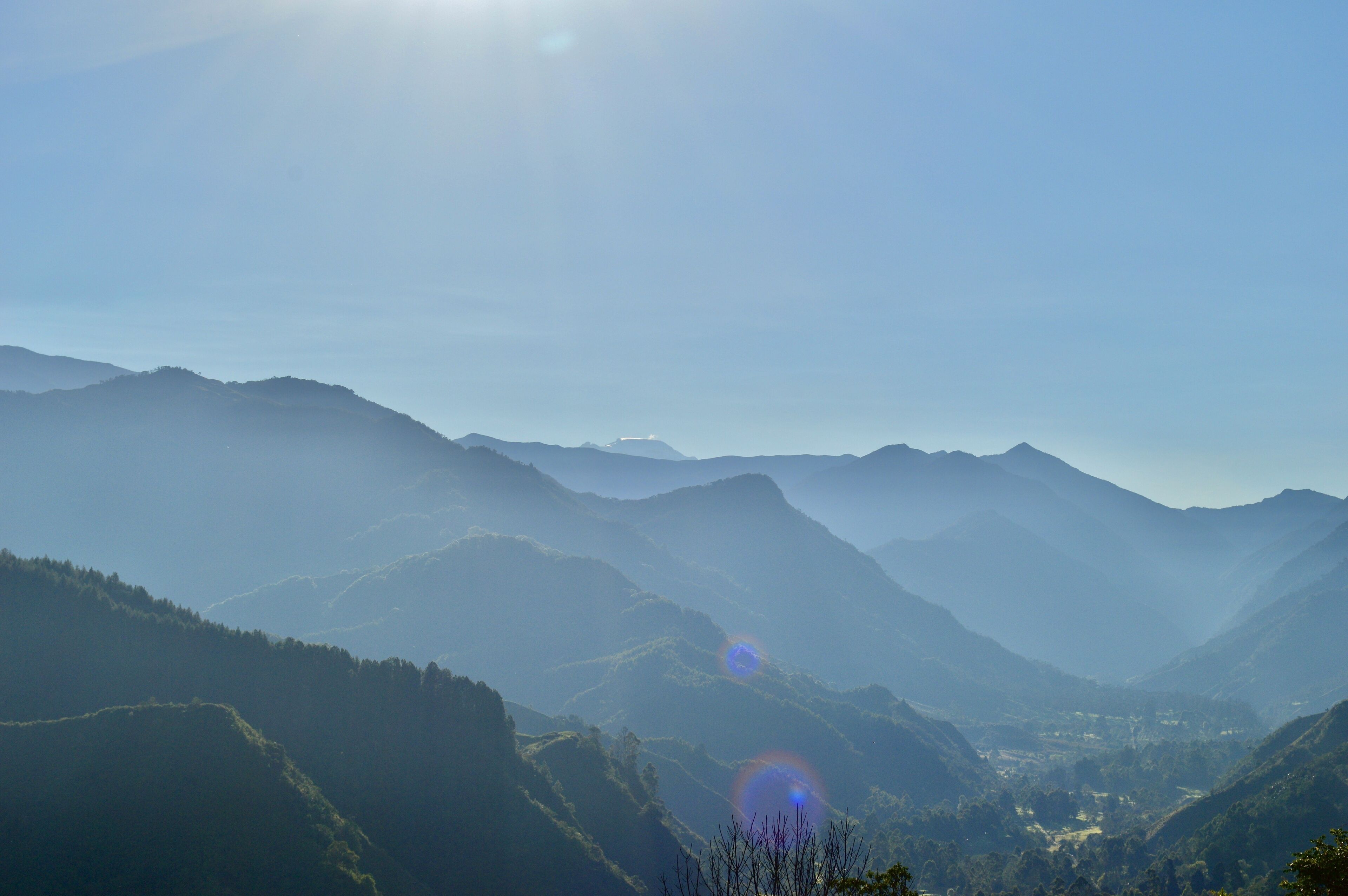 A mountainous landscape with a valley.