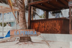 Breakfast, lunch served; local and international cuisine, beach views