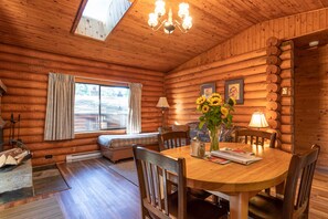 One Bedroom Cabin, King Bed | Living area | 32-inch flat-screen TV with cable channels, TV, streaming services