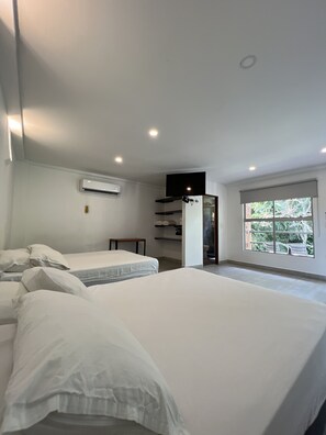 Premium Quadruple Room, 2 Double Beds | Premium bedding, blackout curtains, free WiFi, bed sheets - Parador del Gitano Hotel & Restaurante (Puerto Triunfo)