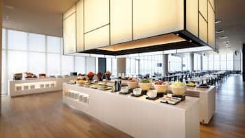 A modern buffet setup with a variety of food items and a spacious layout.