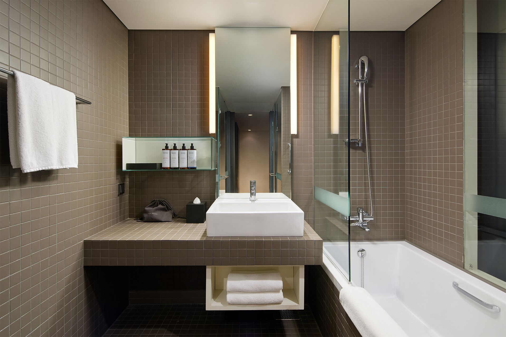 combined shower/bathtub, deep-soaking bathtub, designer toiletries