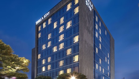 Premium bedding, down comforters, pillowtop beds, in-room safe