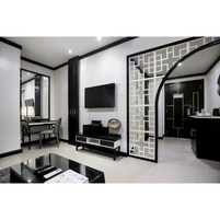 Divine Suite | Living area | 42-inch LCD TV with cable channels, TV