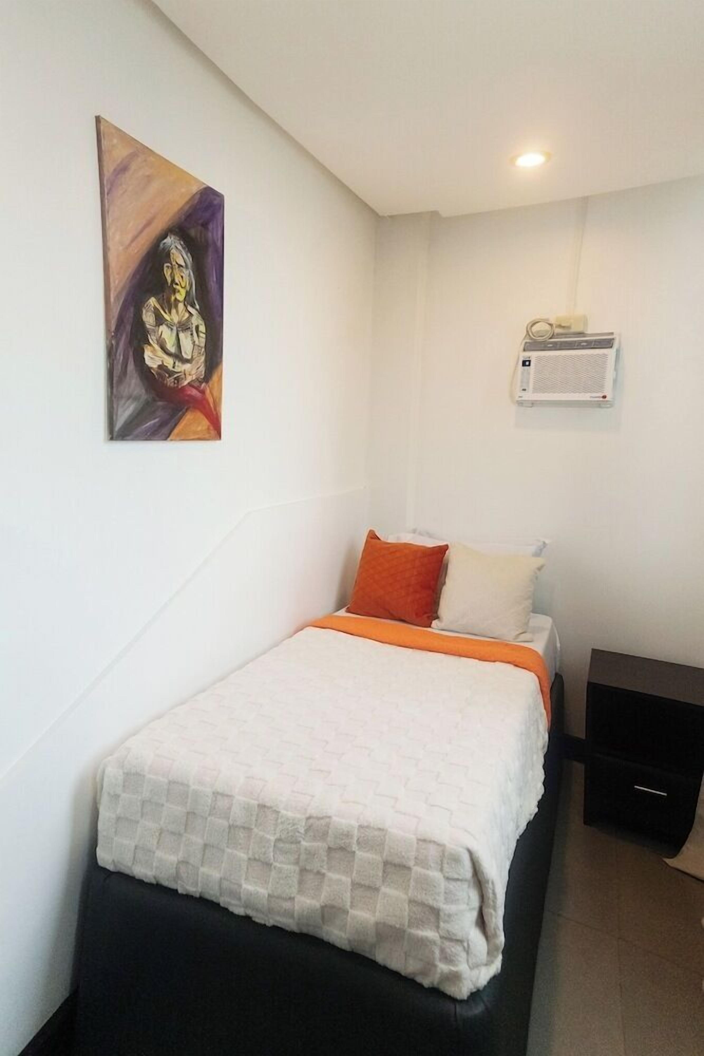 Premium bedding, pillow-top beds, blackout curtains, free WiFi