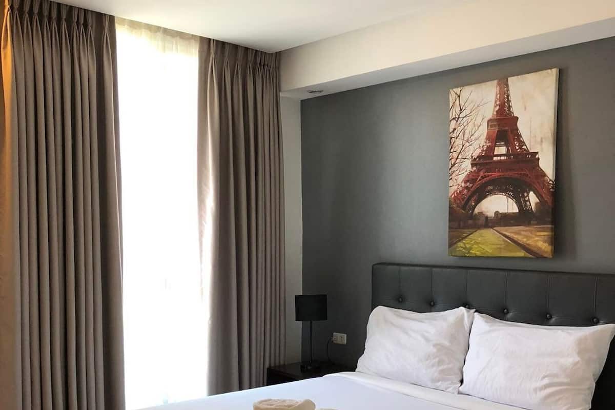 Premium bedding, pillow-top beds, blackout curtains, free WiFi