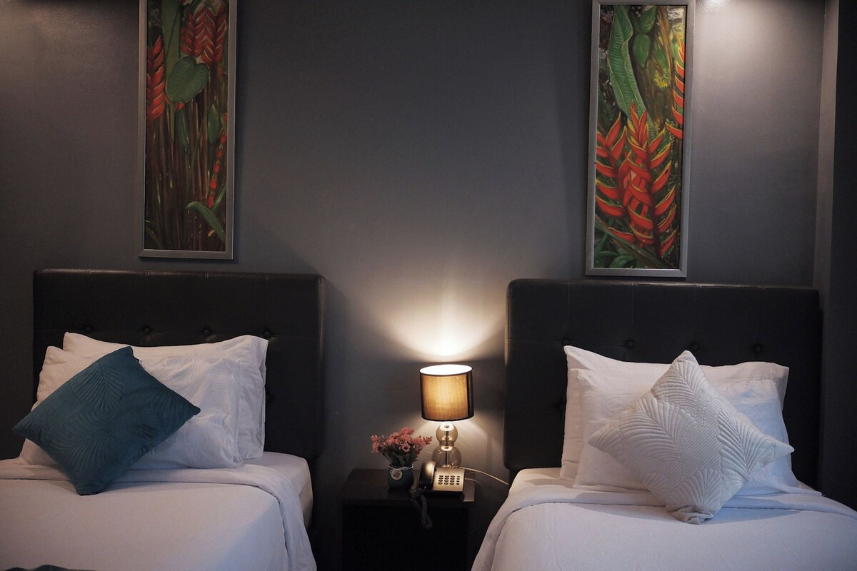 Premium bedding, pillow-top beds, blackout curtains, free WiFi