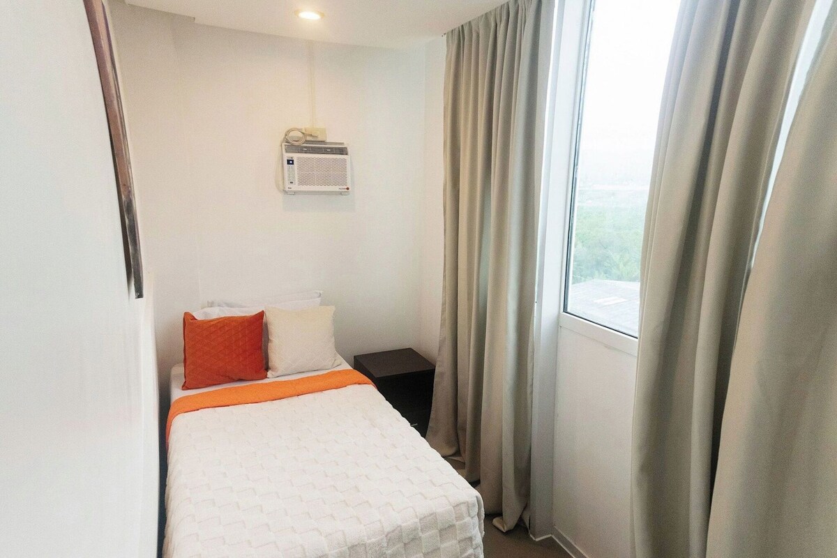 Premium bedding, pillow-top beds, blackout curtains, free WiFi