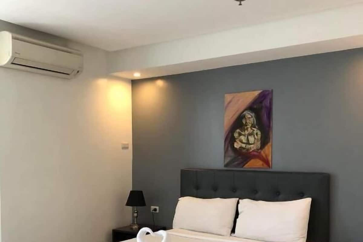 Premium bedding, pillow-top beds, blackout curtains, free WiFi