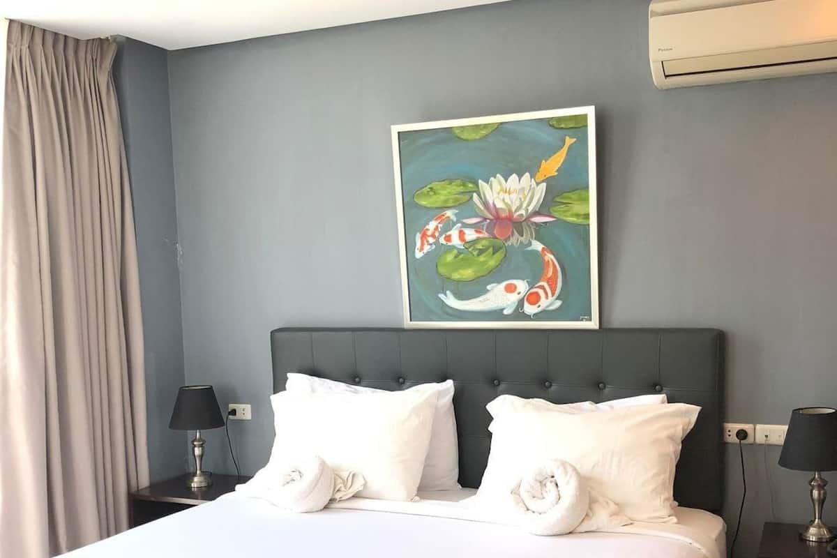 Premium bedding, pillow-top beds, blackout curtains, free WiFi