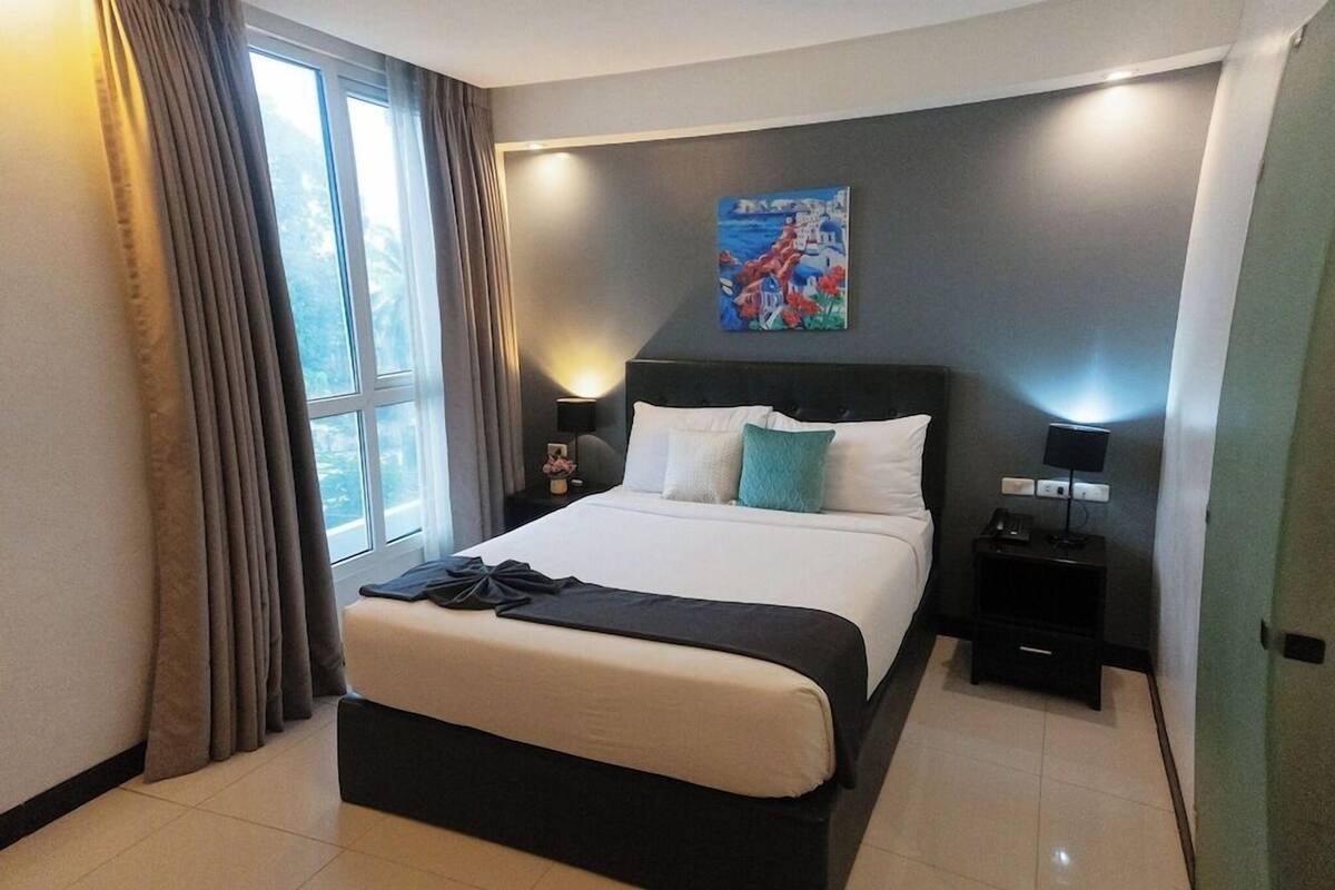 Premium bedding, pillow-top beds, blackout curtains, free WiFi