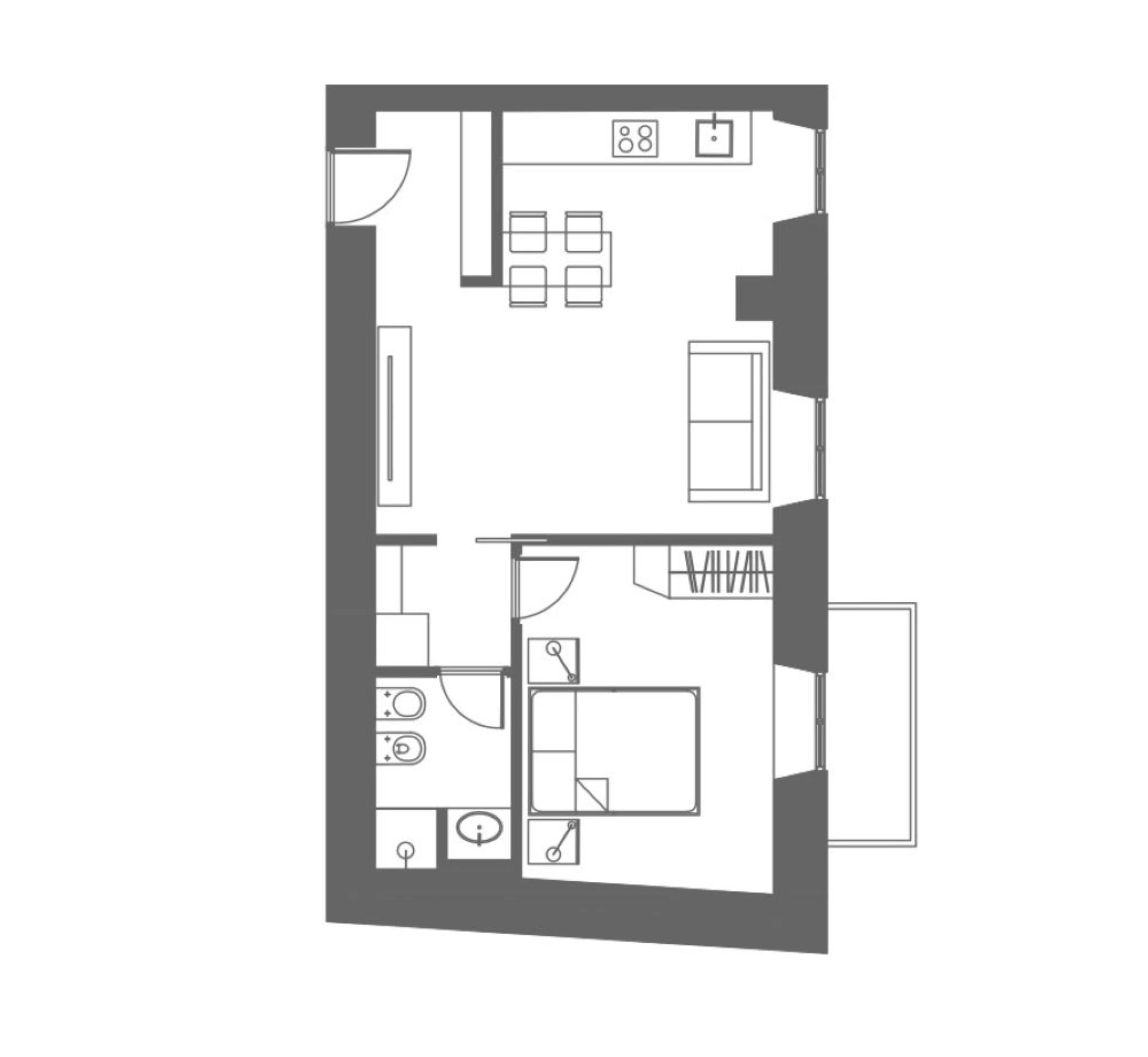 Un plan d’étage d’une chambre d’hôtel comprenant un lit, un bureau, une chaise, une armoire, une salle de bain et une kitchenette.