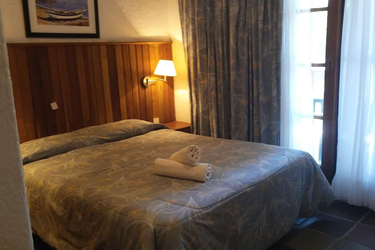 Tweepersoonskamer | Luxe beddengoed, een minibar, gratis babybedden, extra bedden