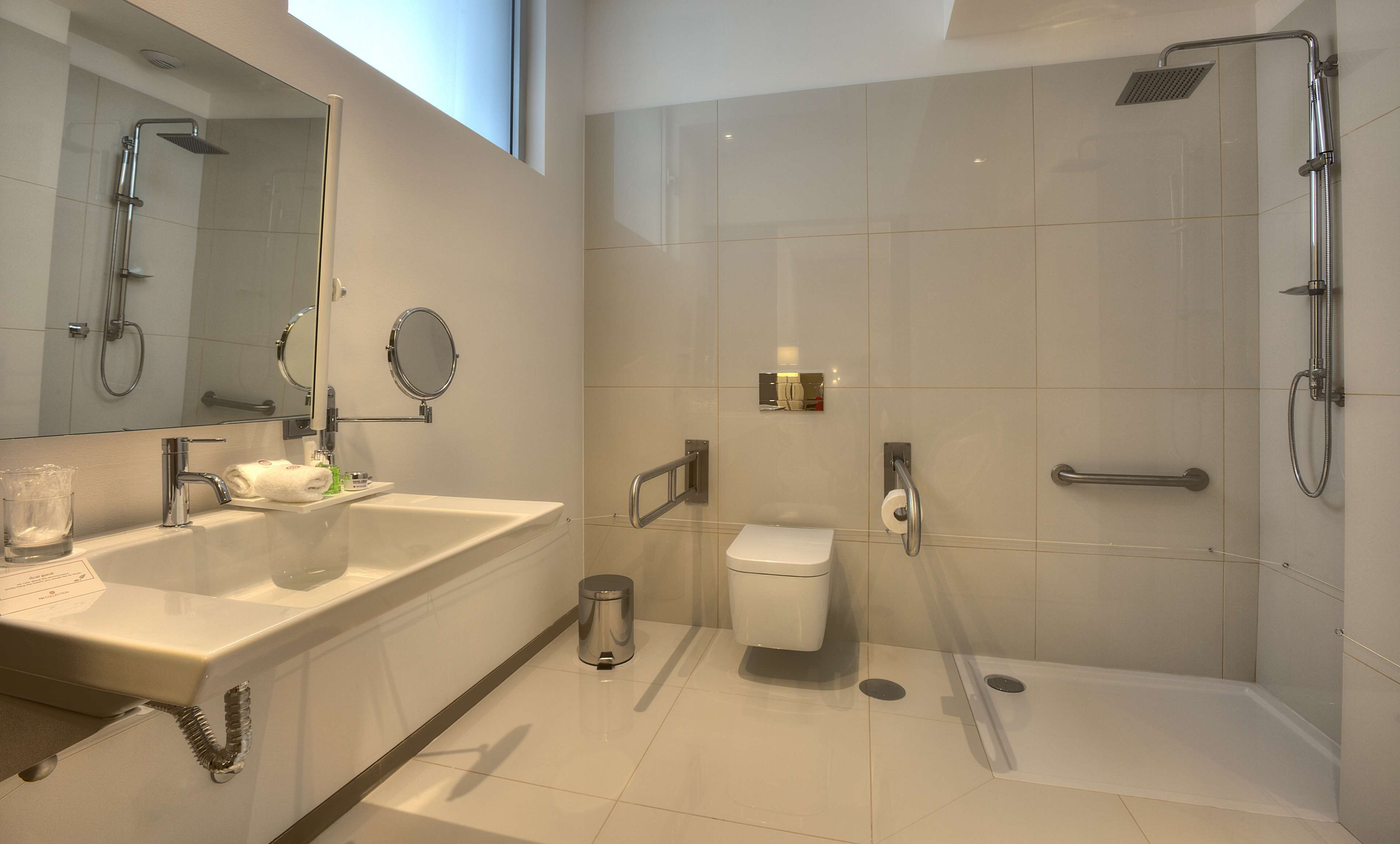 eco-friendly toiletries, hair dryer, bidet, towels