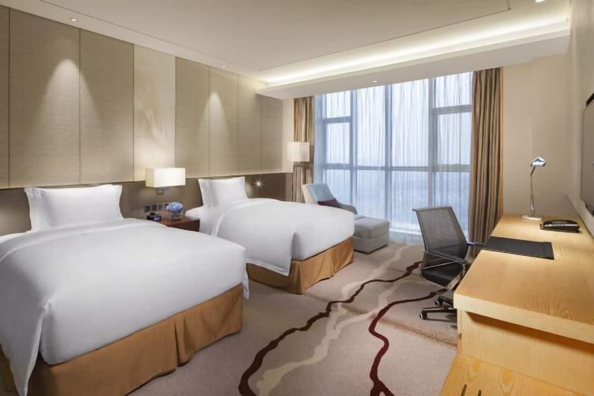 Premium bedding, down duvets, minibar, in-room safe