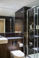 Designer toiletries, hair dryer, towels