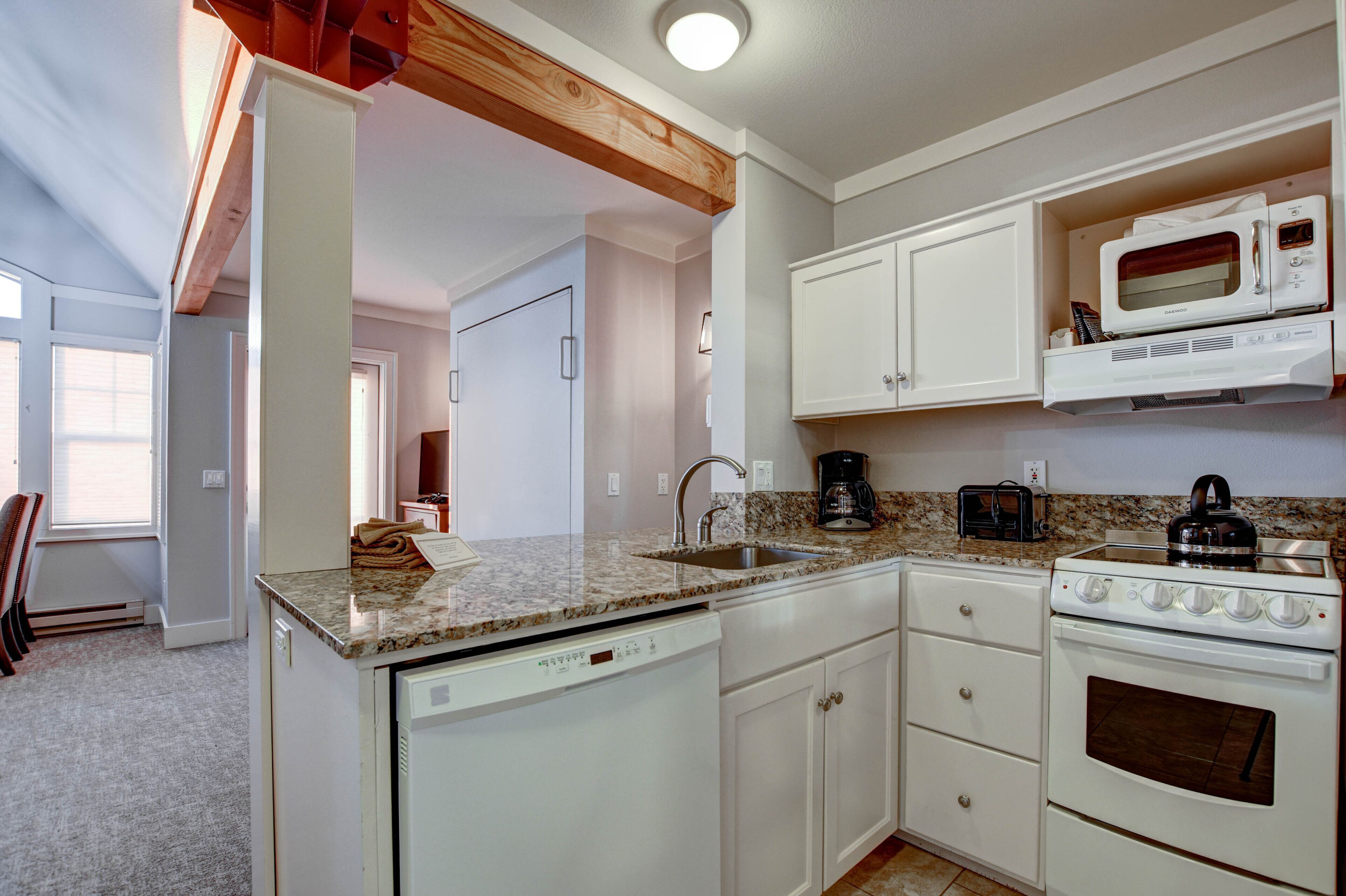 white heron victorian - oceanfront - 1 bedroom king suite - located 3 blocks from hotel property | private kitchen | microwave, coffee/tea maker