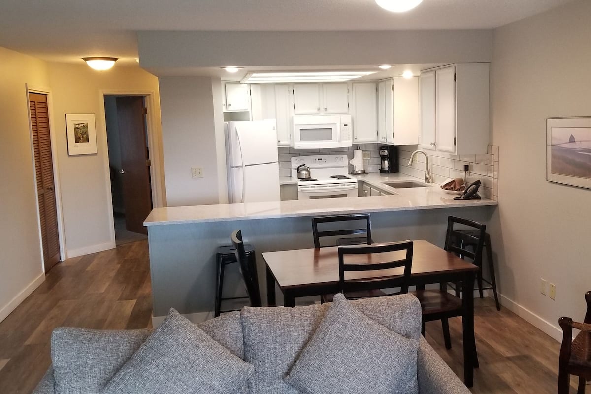 Sandcastle 2 Bedroom, 2 Bathroom Condo - Ocean View - Located 1.5 miles south of Hotel Property | Living area | Flat-screen TV, DVD player