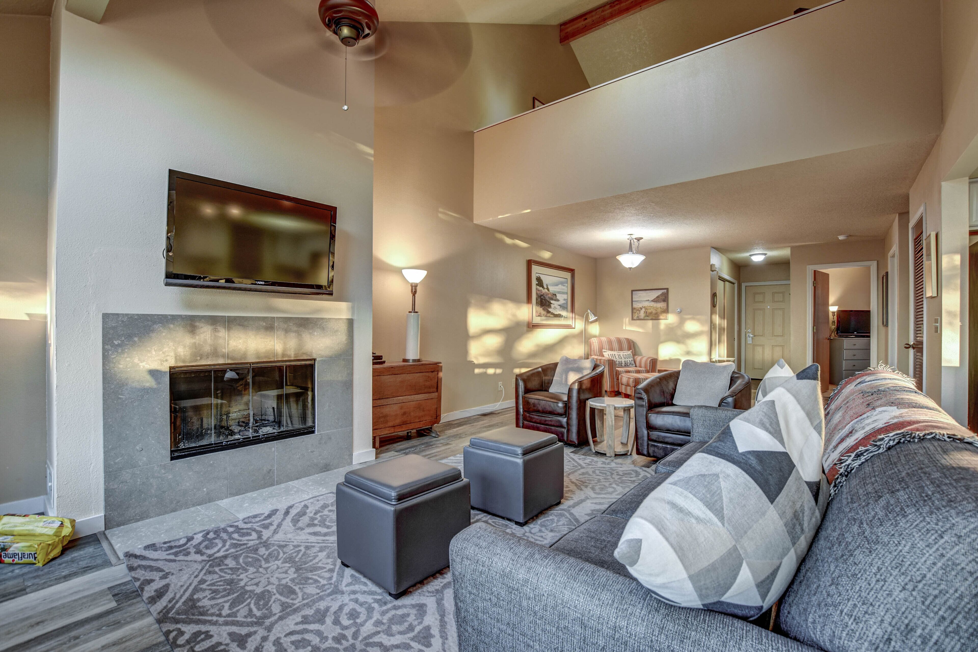 sandcastle 2 bedroom, 2 bathroom condo - ocean view -  located 1.5 miles south of hotel property | living area | flat-screen tv, dvd player