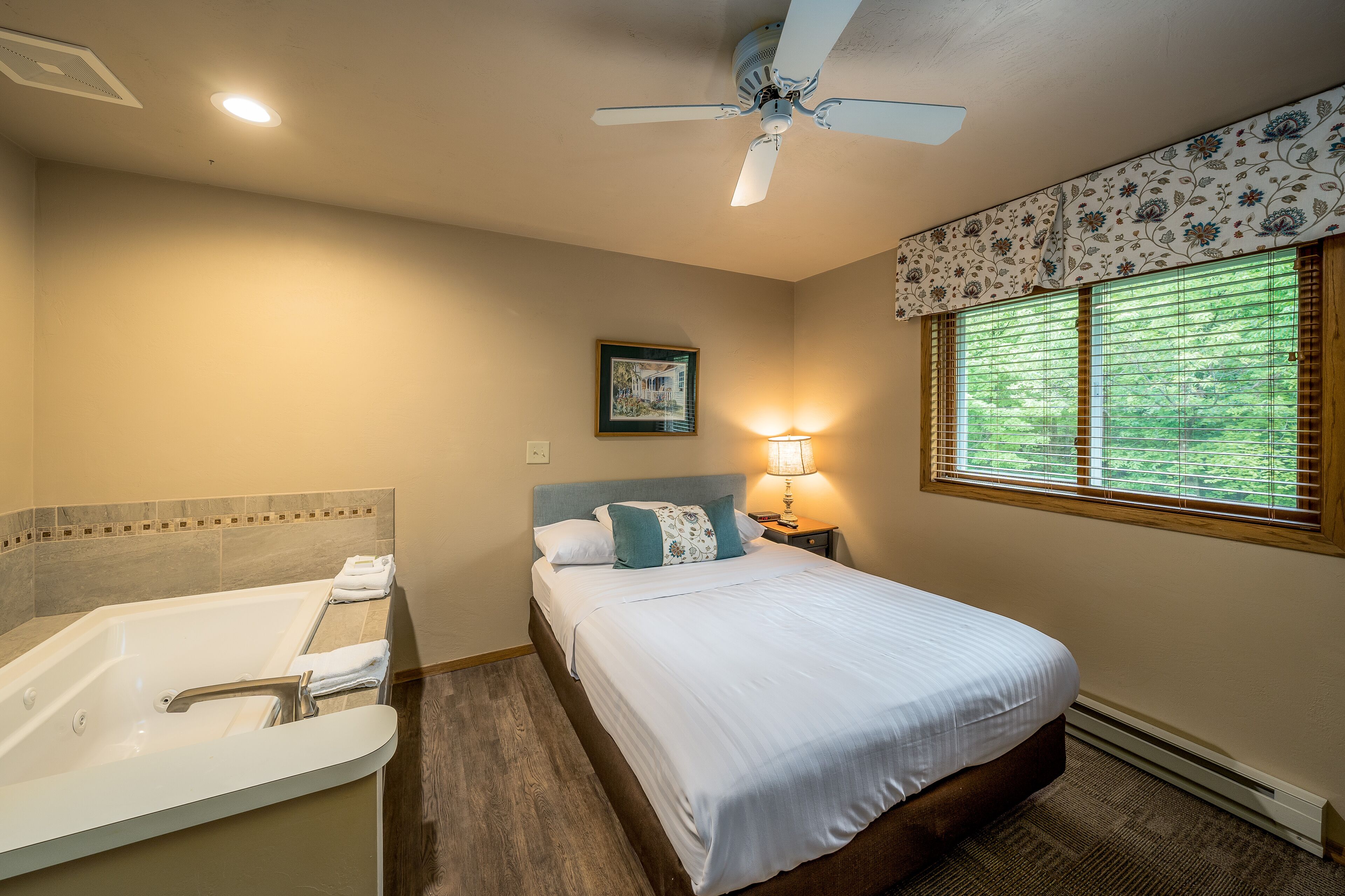 suite with whirlpool, 1 queen bed + sofa bed (no pets) | premium bedding, individually decorated, individually furnished