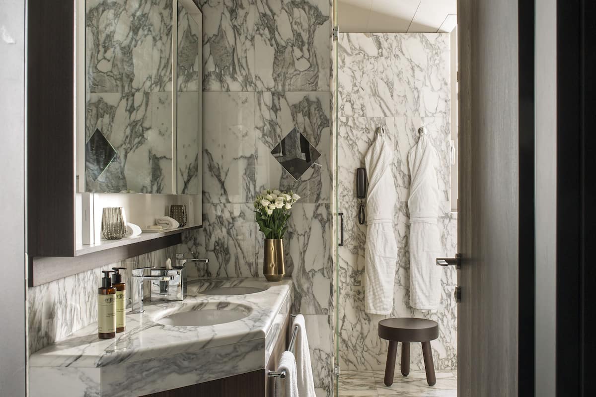 hair dryer, bathrobes, slippers, bidet