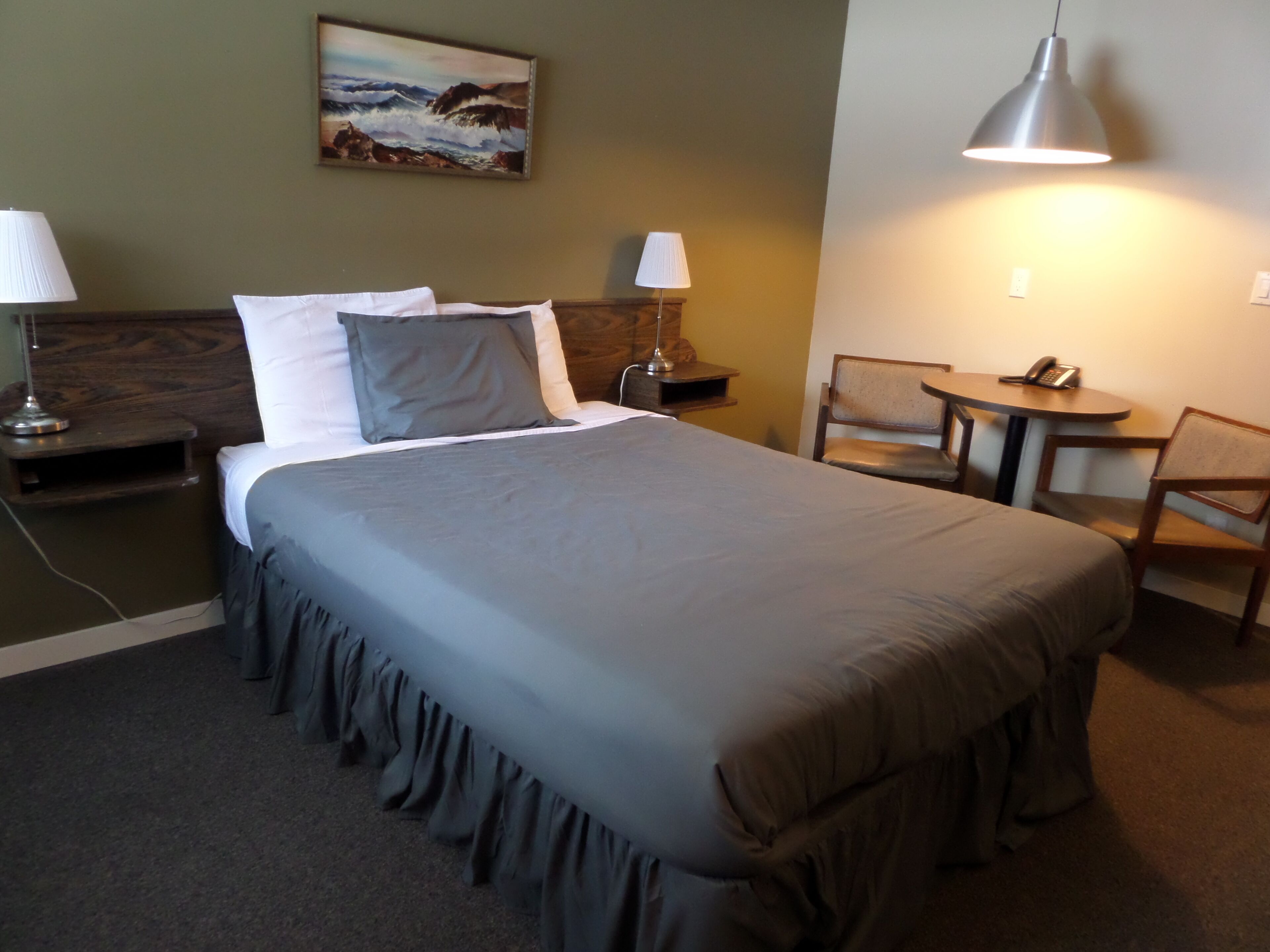 Habitación estándar, 1 cama Queen size, cocineta | Camas extra, wifi gratis y ropa de cama 