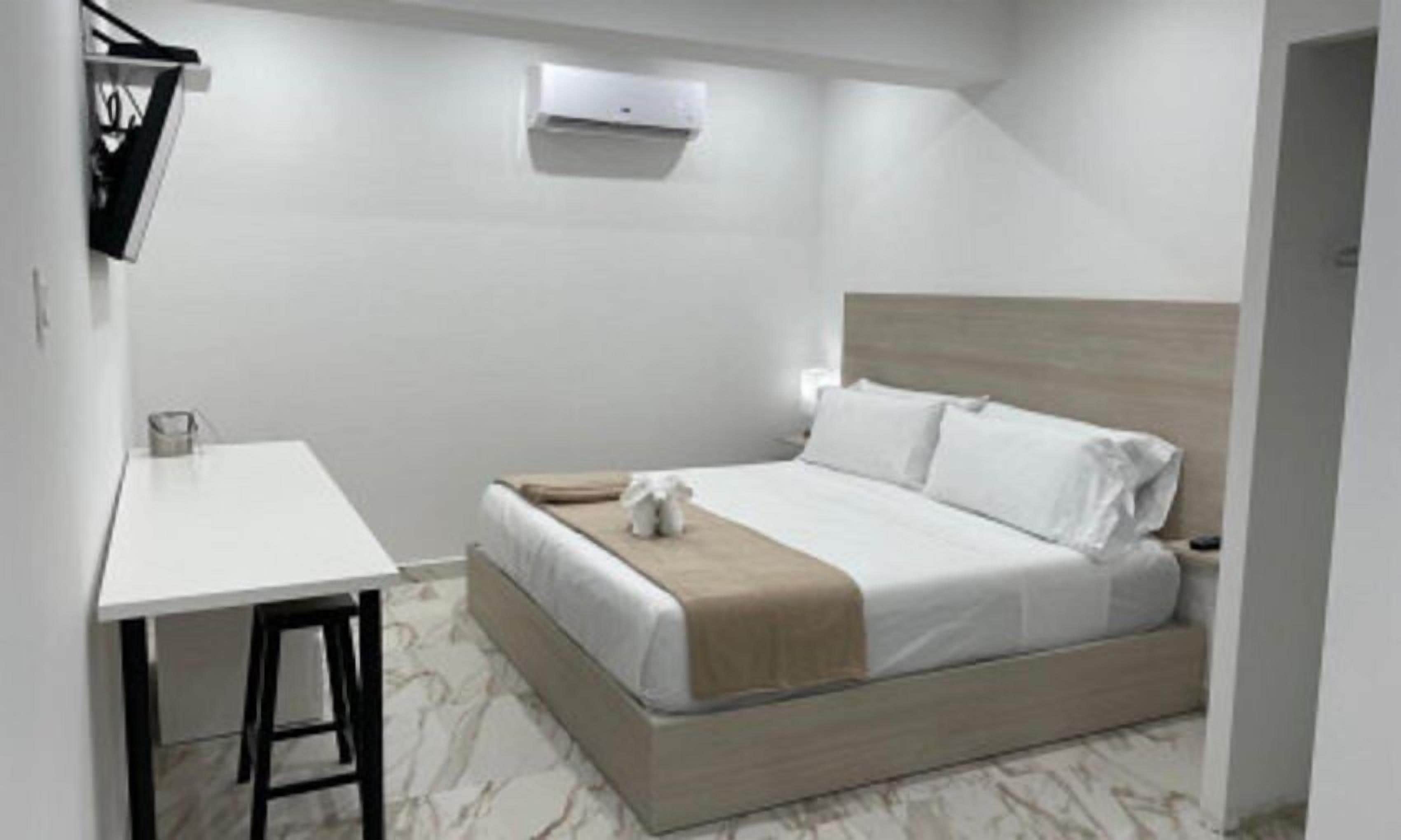 Suite, 1 cama King size | Tabla de planchar con plancha, wifi gratis y ropa de cama 