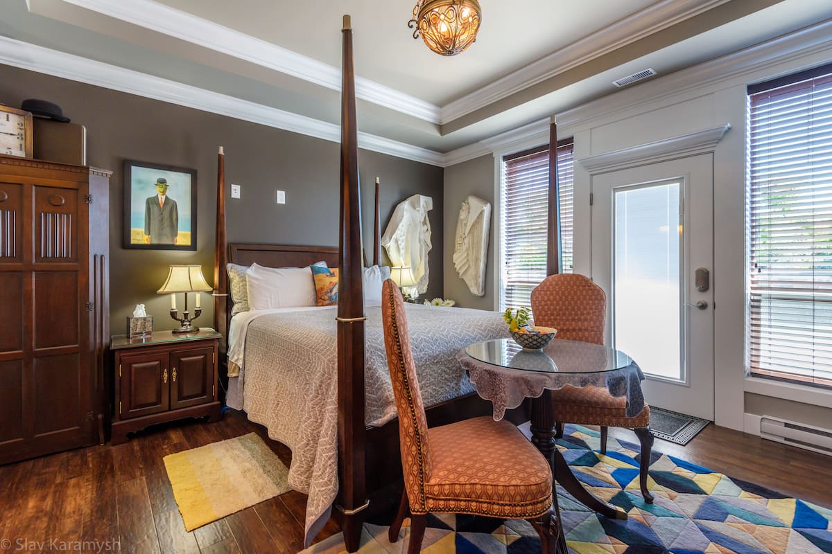 the "thomas crown affair" suite | living area | flat-screen tv, fireplace