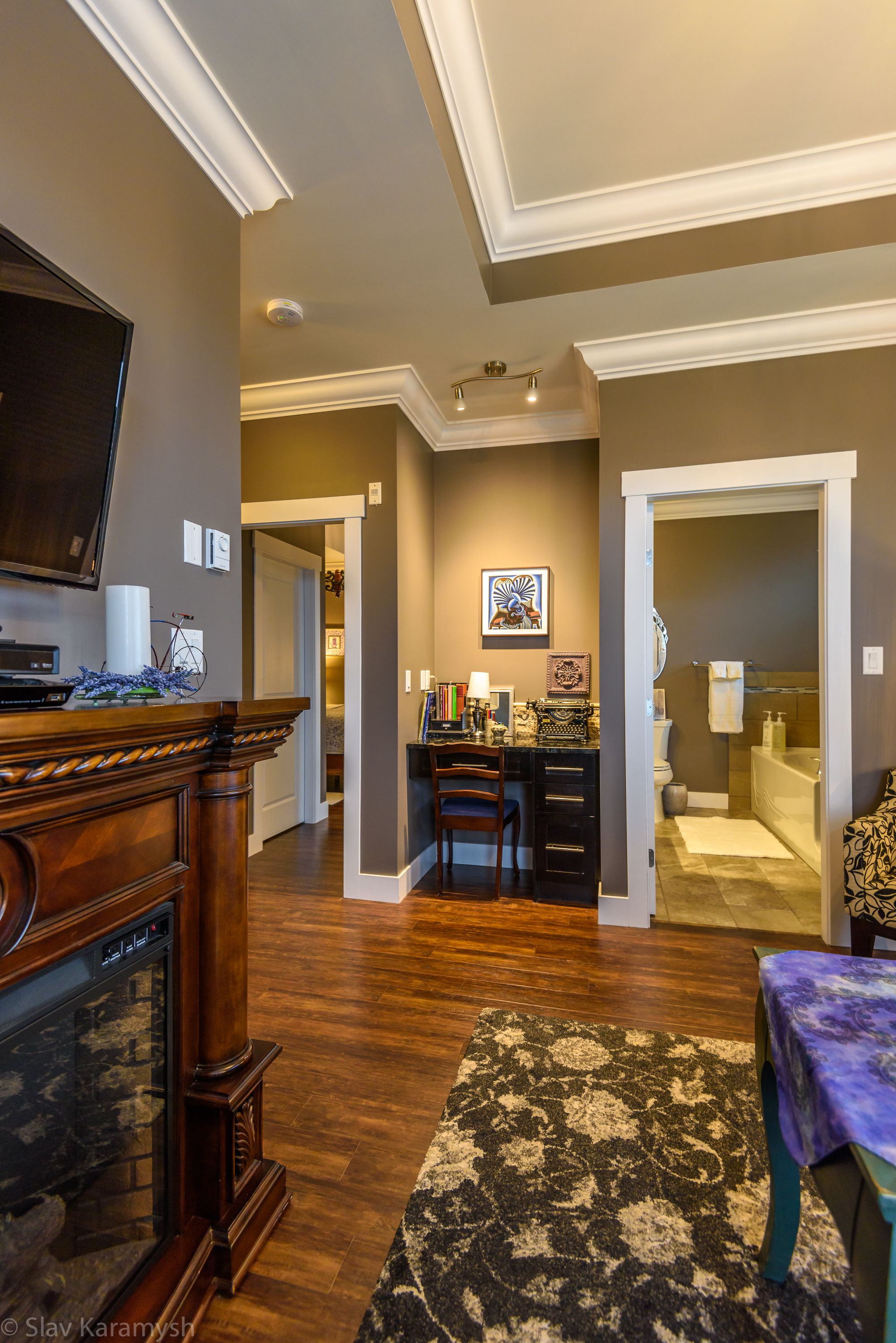 the "midnight in paris" suite | living room | flat-screen tv, fireplace