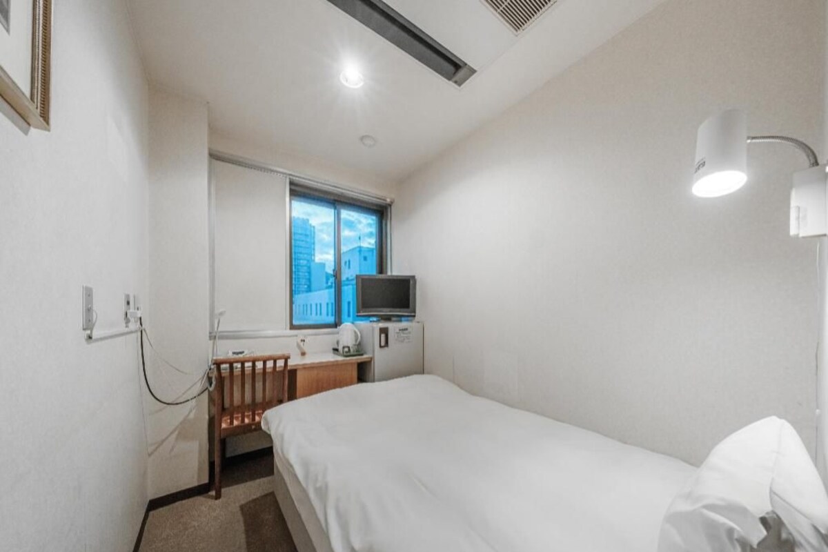 Desk, bed sheets