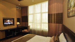 Deluxe Room | Premium bedding, minibar, desk, blackout drapes - Aldar Hotel (Sharjah)