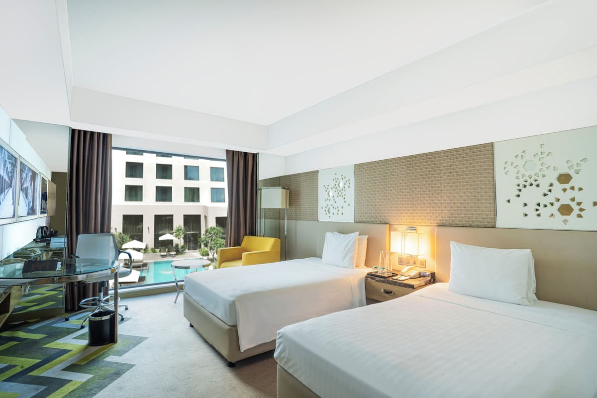 premium room, 2 single beds, pool view | 1 bedroom, premium bedding, minibar, in-room safe