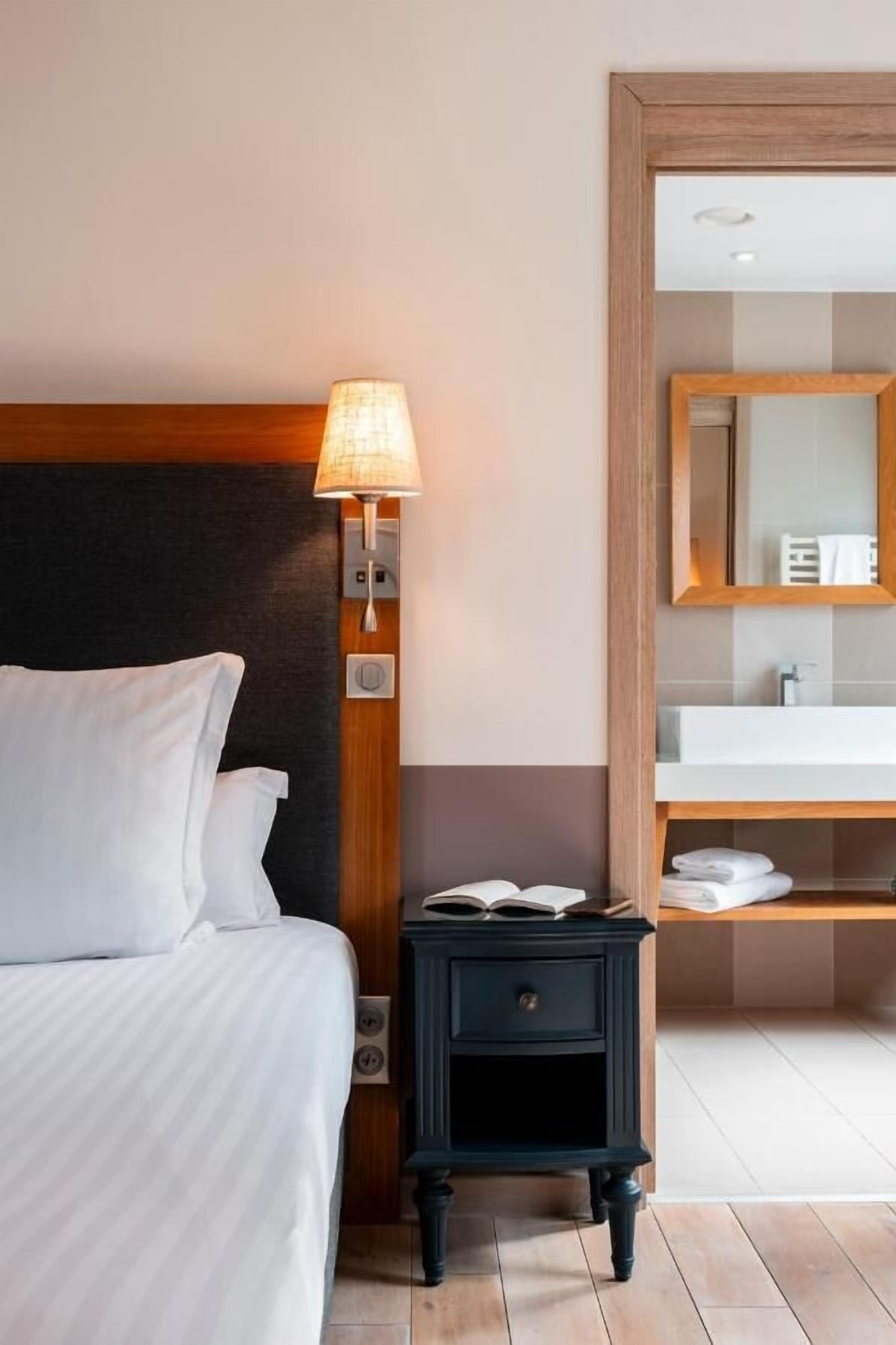 Premium bedding, memory foam beds, in-room safe, desk