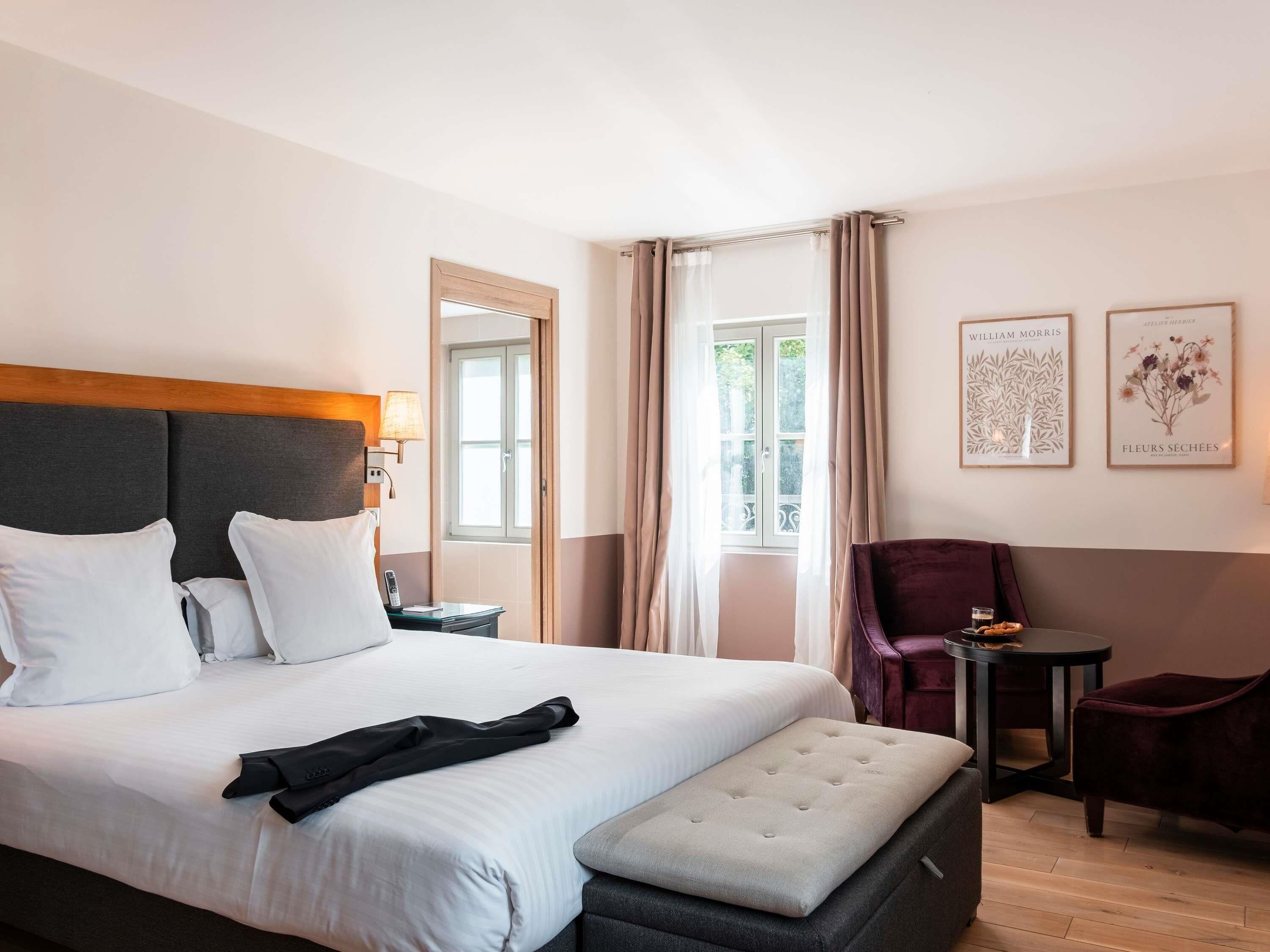 Premium bedding, memory foam beds, in-room safe, desk