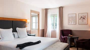 Luxe beddengoed, bedden met traagschuimmatrassen, een kluis op de kamer