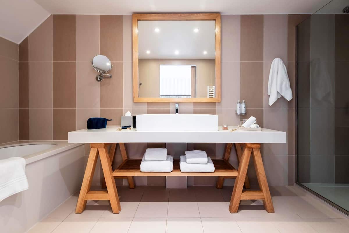 Premium bedding, memory-foam beds, in-room safe, desk