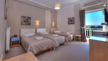 Chambre Triple | Coffres-forts dans les chambres, chambres insonorisées